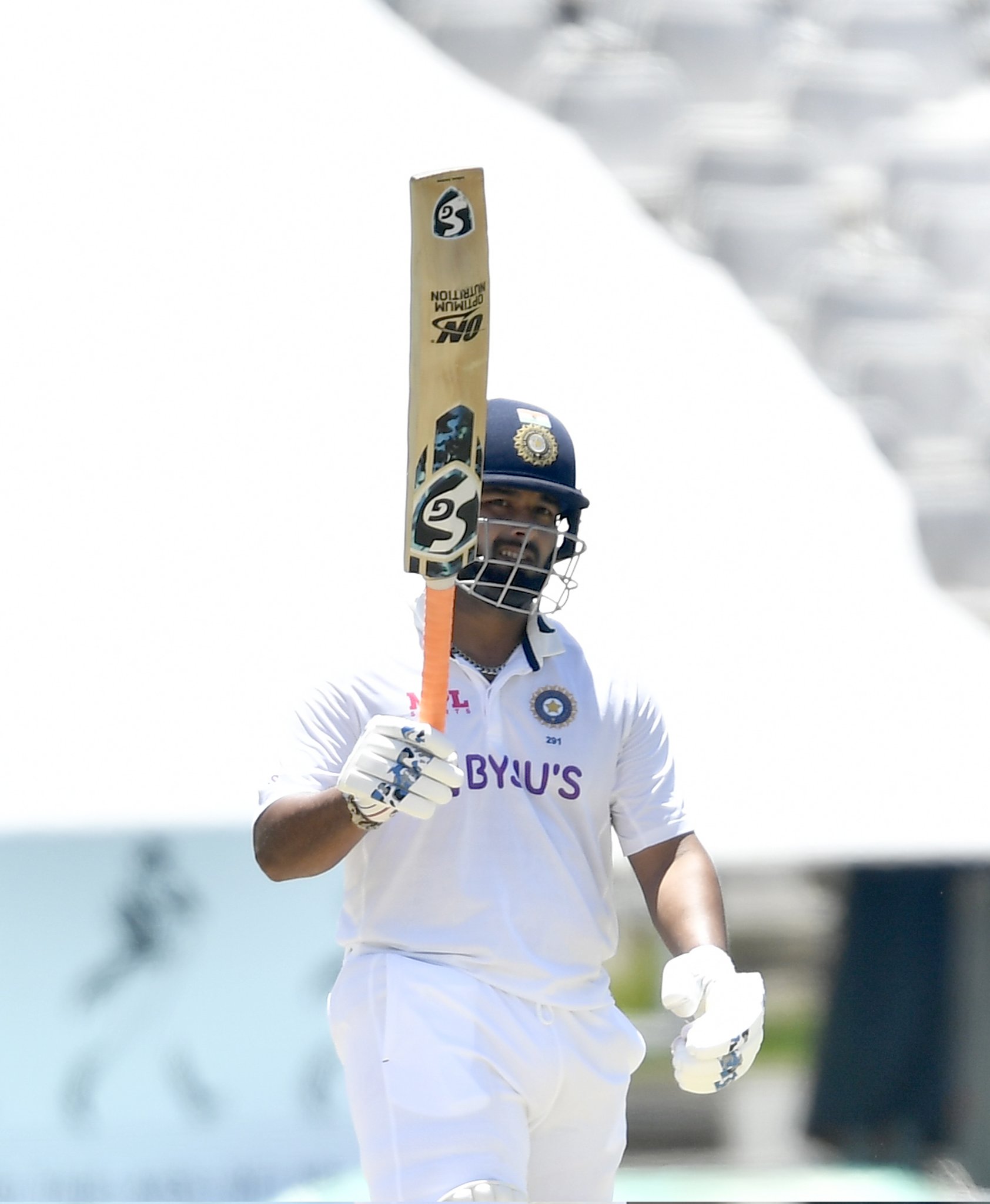 Proteas vs India - Rishabh Pant lifts his bat in celebration of his century at Newlands