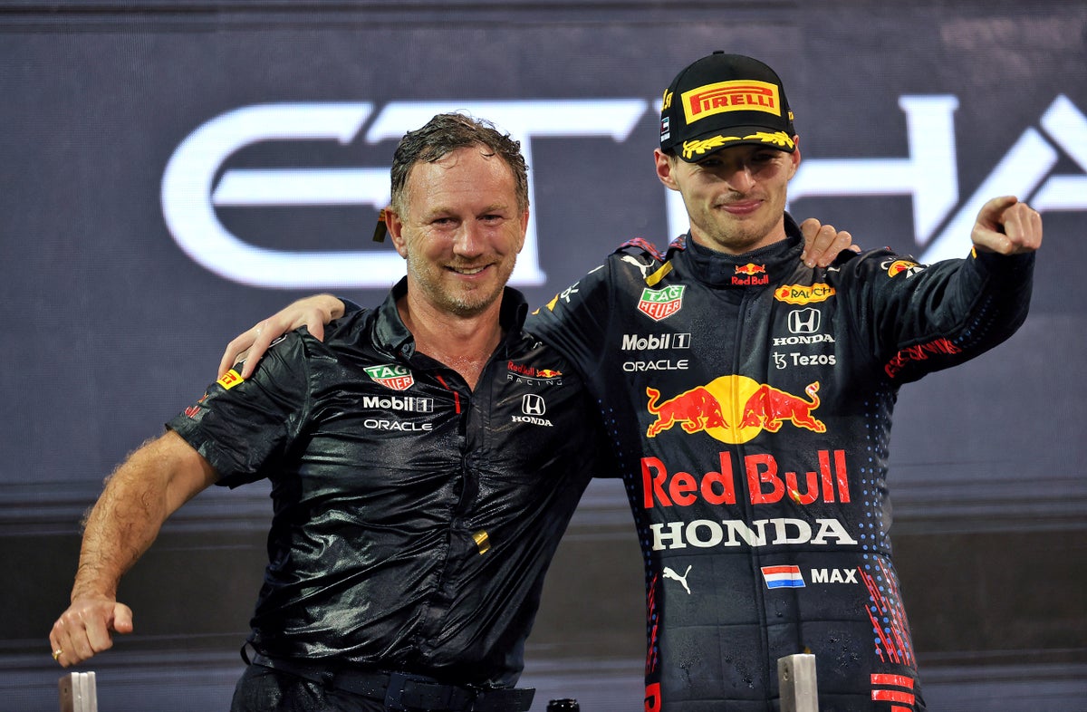 Christian Horner and Max Verstappen celebrating the 2022 Drivers Championship win