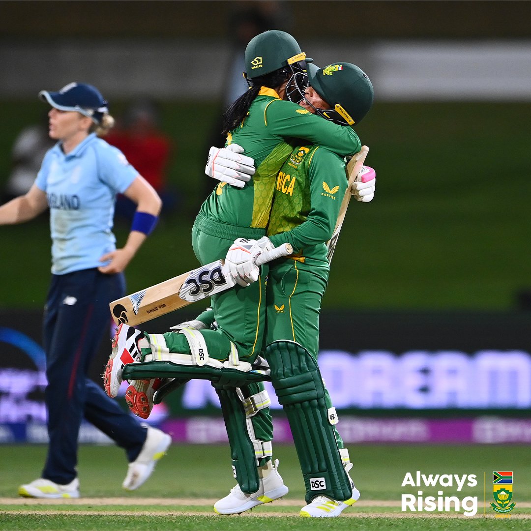 Trisha Chetty and Shabnim Ismail embrace after hitting the winning runs in their win over England at the ICC Woman's World Cup.