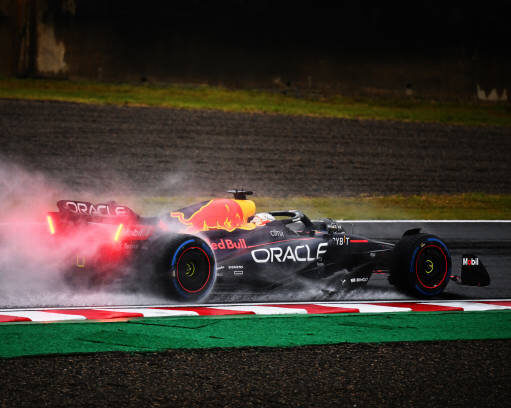 Max Verstappen in his Red Bull during the F1 race in Japan driving in the rain