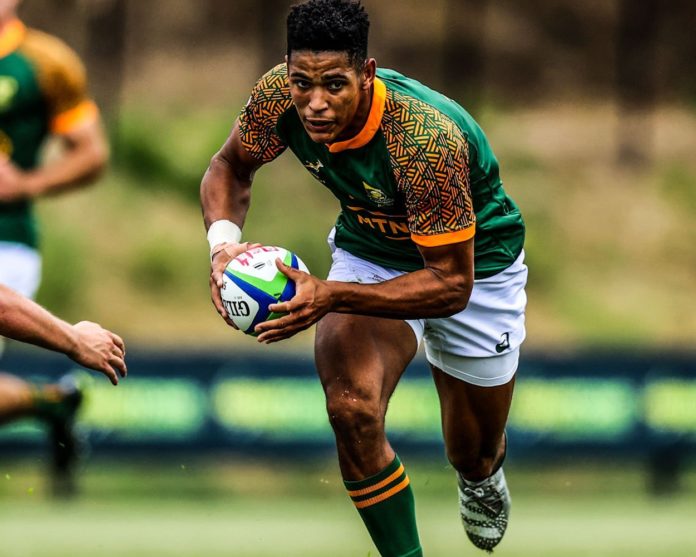 Sacha Mngomezulu carrying the ball for the Junior Springboks in a match against England - Mngomezulu and Manie Libbok earned a maiden call up to the Bok Squad