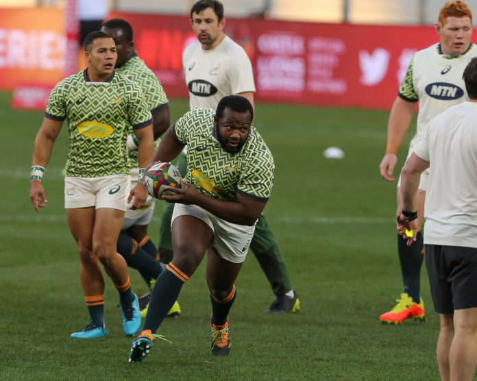 Ox Nche running with the ball during a Springbok team warm-up session against the B&I Lions