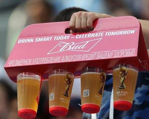 Four Budweisers being carried in a special tray at the 2018 FIFA World Cup in Russia