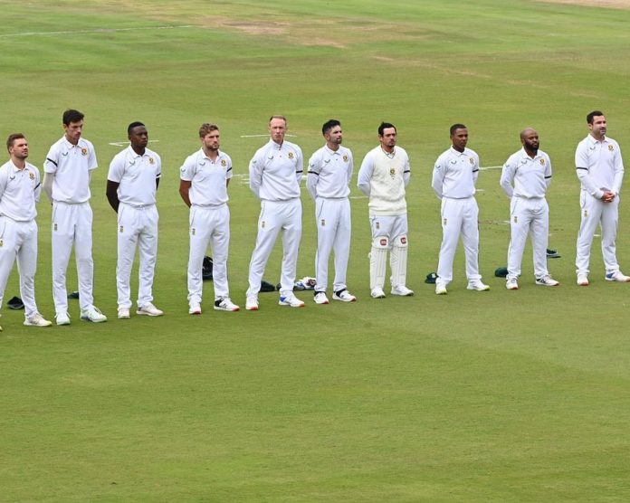 The Proteas test team lined up to sing the national anthem