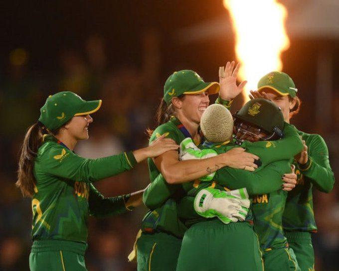 The Protea Women embrace after Nonkululeko Mlaba took a wicket.