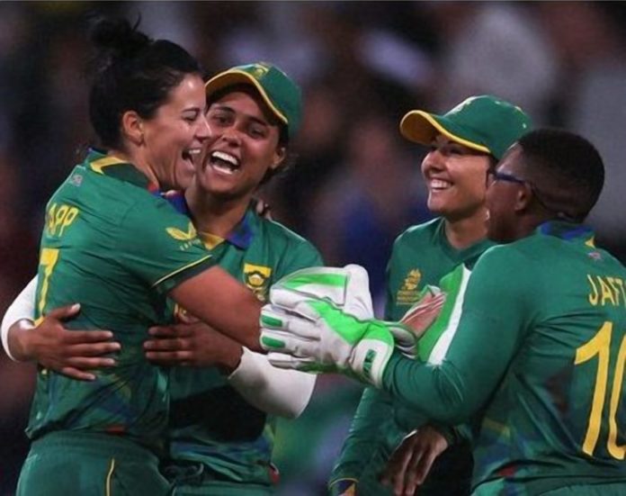 Mometum Proteas embrace as a Bangladesh wicket falls.