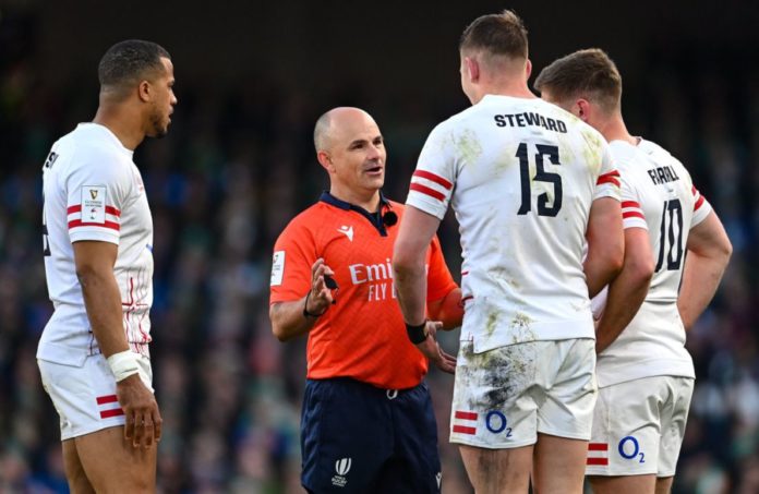 Jaco Peyper in a conference with Freddy Steward and England's captain, Owen Farrell