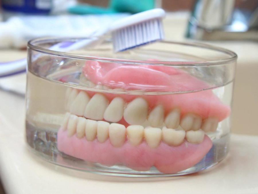 dentures in a glass of water 