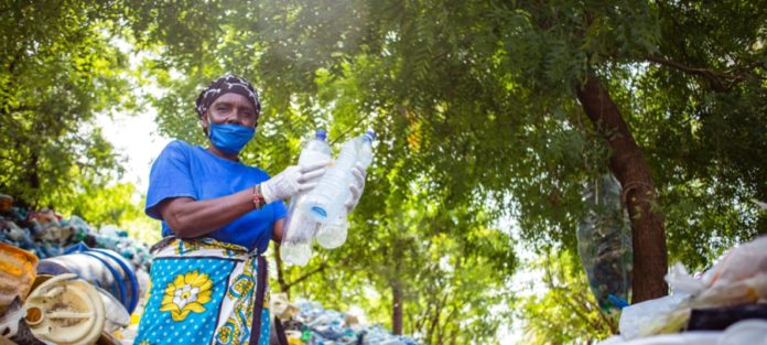 woman recycling plastic