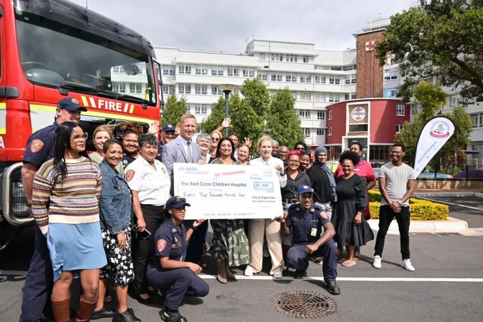 firefighters donate money to red cross children hospital