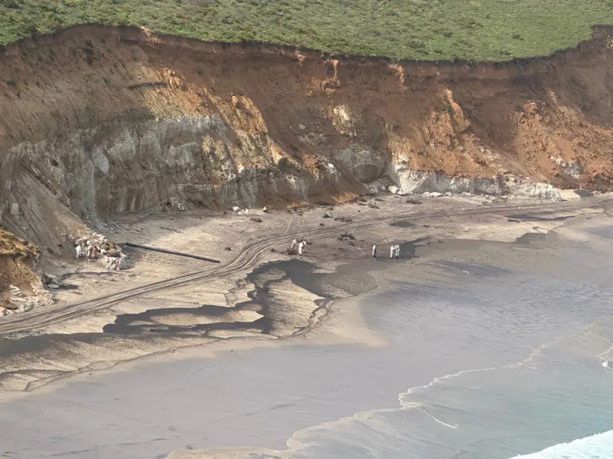 beach clean-up underway