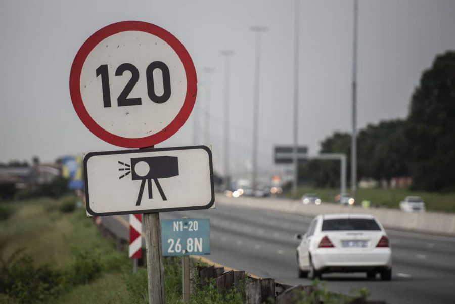 speeding sign on the highway - traffic officers