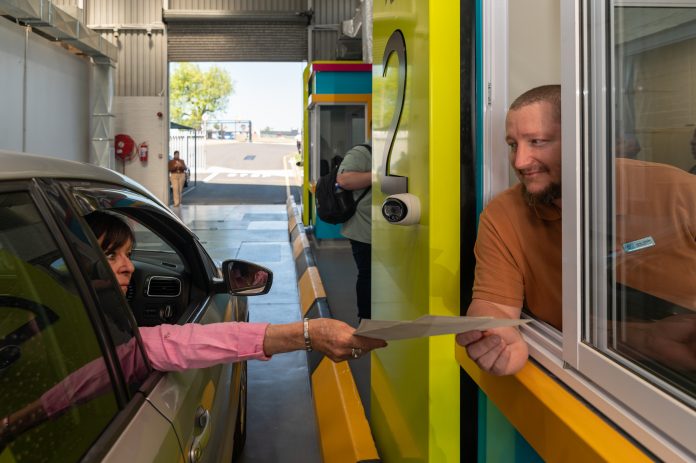 the first City drive through vehicle license renewal center