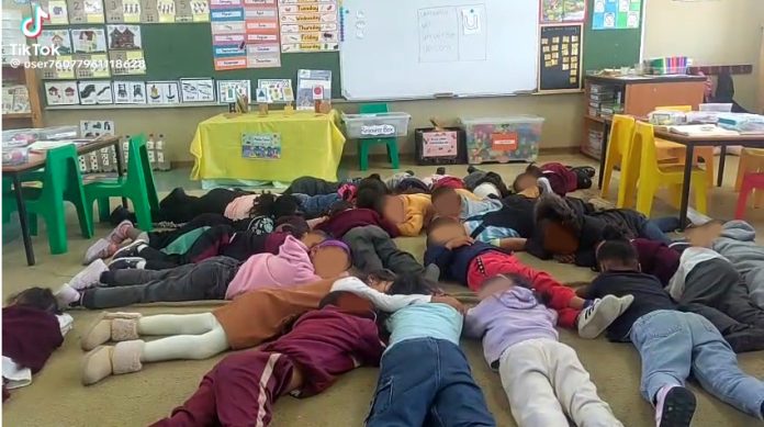 watch - tafelsig learners lie on ground